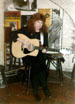 Jana playing at Bunjie's Folk Cellar in London. 